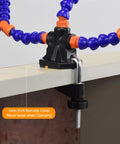 Helping Hand Soldering Setup With Flexible 360 Degree Stainless Steel Arms clamped on table edge close-up