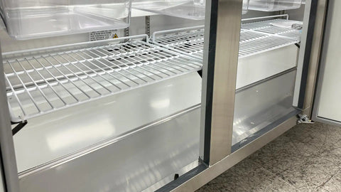 Interior view of Commercial Buffet Cold Table Refrigerator Delivers Prime Cooling And Slick Stainless Steel Exterior 72 Inch Wide Salad Display Counter Fridge Cooler.