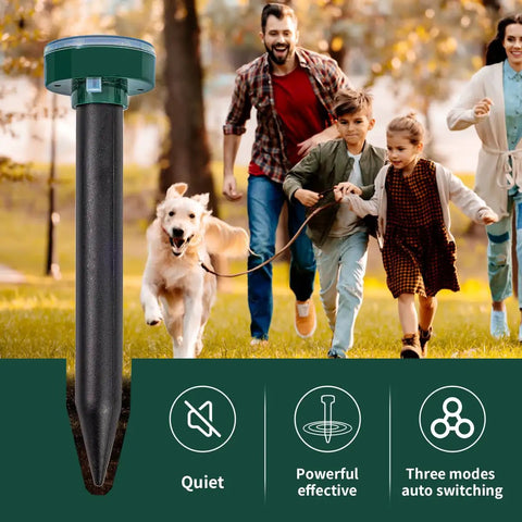 Family with dog running through park featuring 8 Pack Solar Powered Mole Repellent Stakes For Lawns Gopher Deterrent Ultrasonic Snake And Vole Repeller Chaser Outdoor Yard Pest Control For Gardens And All Pests.