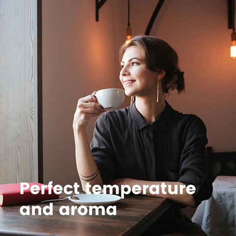 Premium Fully Automatic Coffee Maker Built For Your Daily Grind Features Smart App Control and Intuitive Touchpad, stylish woman enjoying coffee.