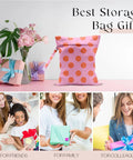 Coral Pink Polka Dot Wet Bag And Dry Bag For Beach And Pool Waterproof on table with gifts and flowers, ideal for all occasions.