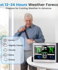 Wireless Indoor Outdoor Weather Station With Color Display Digital Temperature And Humidity Monitor Alarm Clock USB Port Adjustable Backlight 6.1 Inch Screen Easy To Read Interface Black And Silver on table with forecast icons