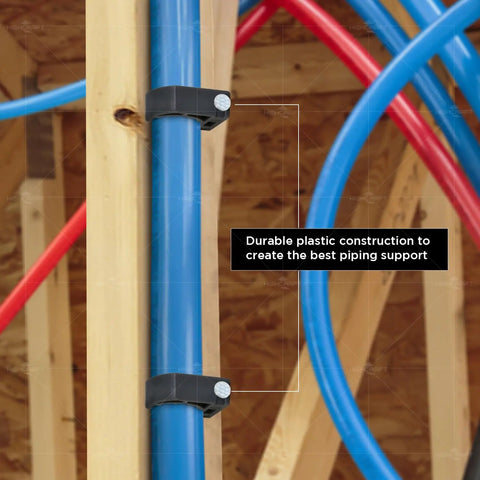 Half Clamp J Hook With Nail For PEX Tubing Support One Half Inch Black Durable Plastic Pipe Hanger on wood frame