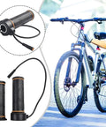 Full Twist Throttle For BBS01 And BBS02 HD E Bike Electric Mid Drive Motor 12 To 72V Automatic Voltage Detection Heavy Duty Metal Build Super Durable Grip That Handles All Rides Like A Champ. black rubber e-bike full twist throttle with cable, shown on handlebar