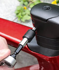 Close-up of All In One Bike Repair Kit With Mini Ratchet Wrench And Ten Bits One Quarter Inch Ratcheting Driver on bike handle