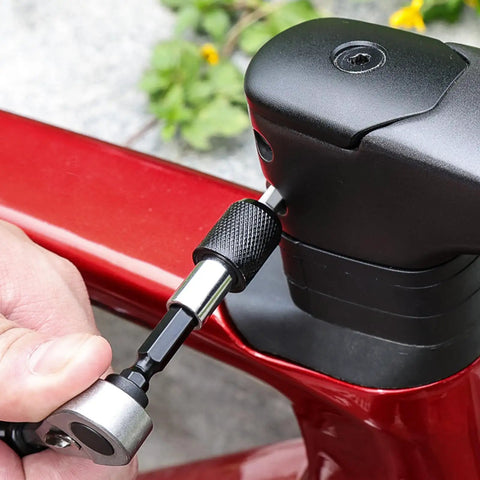 Close-up of All In One Bike Repair Kit With Mini Ratchet Wrench And Ten Bits One Quarter Inch Ratcheting Driver on bike handle