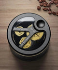 Top Shelf 54Mm Spirographic WDT Tool Espresso Coffee Distribution rotary gear driven, black aluminum design with visible gears.