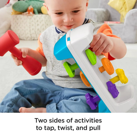 Toddler playing with Toddler Tap And Turn Tool Bench Play Set For Tiny Tot Builders, Kid Friendly, A Two Sided Construction Toy