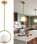 Yunnix 1-Pack Gold Pendant Lights Kitchen Island, Globe Glass Shade, E26 in modern kitchen, featuring milky white globe and gold finish.