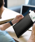 Black Bubble Mailers 4x8 Inch 50 Pack Padded Self Seal Envelopes With 4x7 Inner Size Opaque Waterproof Shipping Bags in use