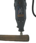 PowerPro Variable Speed Rotary Tool Kit With 85-Piece Accessory Set in use for wood carving