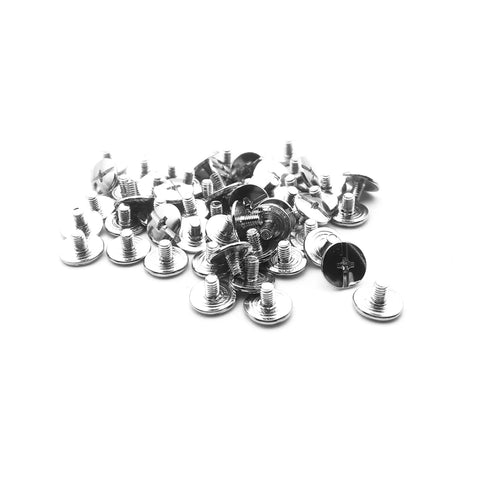50 Pack Nickel Plated Chicago Screws Featuring Durable Carbon Steel Build And Easy Grip Cross Head For Securing Leather Goods Planning Sheets And Custom Book Bindings Top Shelf Legit Craft Gear, close-up of screws.