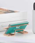 Rose Gold Dope Metal Card Holder For Desk Sleek Card Organizer For Men And Women Large Capacity 3.9x1.9 Inches on white desk