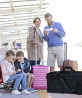 Family at airport with 65L Duffle Bag With Shoes Compartment, Foldable Travel Duffel, Lightweight Black, by luggage