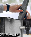 Hand using 16 Piece Set Of 1/4 20 X 3/4 Inch Round Knob Bolts Made From Top Grade Stainless Steel Thumb Screws on metal frame.