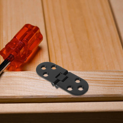 Beefy Heavy Duty Folding Table Hinges Aluminum Alloy Concealed Flip Hinges on wooden surface with red screwdriver