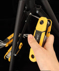 Hand using 17-Piece Folding Allen Wrench Set With Metric And SAE Hex Tools For Tight Spaces on bike frame