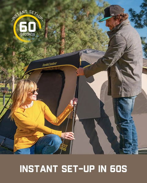 Two people setting up Zeta C6 Pro Six Person Instant Cabin Tent With 60 Second Setup, Rainfly Included, in a park