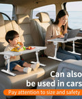 Adjustable Bedside Laptop Desk With Height And Angle Adjustments in car, used by adults and kids for eating and working.