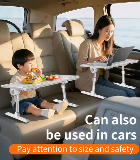 Adjustable Bedside Laptop Desk With Height And Angle Adjustments in car, used by adults and kids for eating and working.