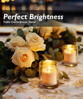 12 Pack Timer Flameless LED Votive Candles For Weddings With Auto On Off 6H 18H next to white roses on table