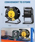 Heavy Duty Extension Cord Reel With Four Grounded Outlets Open Retractable Cord Winder displayed on workbench