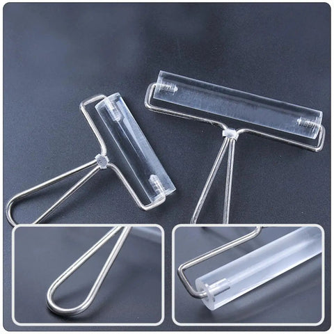 Heavy Duty Stainless Steel Paint Roller Set Two Piece Smooth Glide Action For Fast Canvas Coverage And Killer Oil Acrylic Finishes Game Changing Printmaking Essential viewed from above showing metal frame and transparent rollers.
