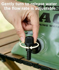 Hand adjusting spigot on Heavy Duty Portable Camping Water Bag With Spigot For Outdoor Drinking, leak-proof faucet shown.