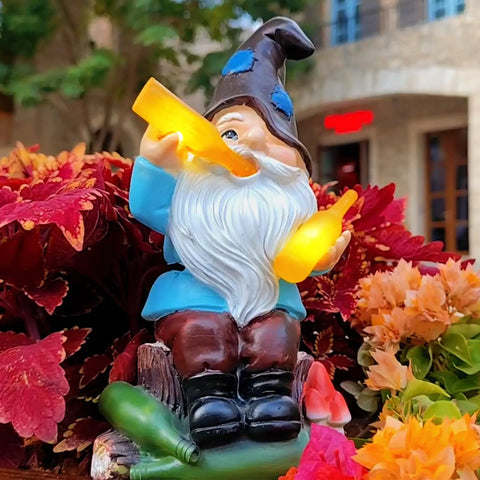Charming Gnome Garden Decor Statue With Solar Light Lantern For Outdoor Yard Patio Lawn Balcony Porch Weatherproof Resin Figurine Waterproof Garden Ornament An Awesome Gift For Women Mom Grandma in flower bed.