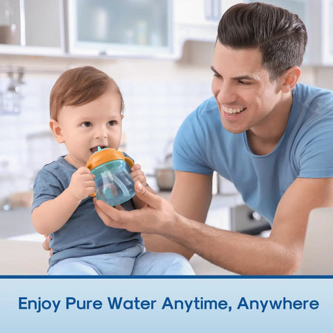 Man helping child drink water with Replacement Water Filter For PUR Pitchers And Dispensers in kitchen