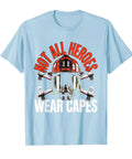 Men Firefighter Graphic T Shirt With Not All Heroes Wear Capes Print In Soft Baby Blue Cotton, featuring helmet and tools design.