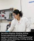 Person in lab coat and safety glasses using Foam Ear Plugs Bulk Pack 200 Pairs NRR 29 Decibels for workshop safety.
