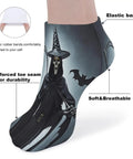 Dark-themed sock with skull print showing elastic bands, reinforced toe seam, soft breathable fabric, close-up view.