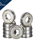 Ten chrome steel shielded miniature ball bearings, ID 3/8 in, OD 7/8 in, width 9/32 in