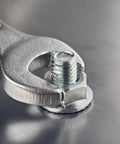Close-up of wrench tightening bolt in 20 Piece Carbon Steel Carriage Bolts And Nuts Kit Fully Threaded Zinc Plated With Washers