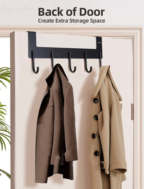 Over The Door Towel Rack With 5 Heavy Duty Aluminum Hooks holding coats on door, matte black finish