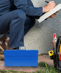 Badass Blue Iron Double Layer Toolbox Organizer With Grip Carry Handle Portable Heavy Duty Build For Garage Setup Or Job Site Grind To Keep Tools Locked In, placed on grass with tools nearby.