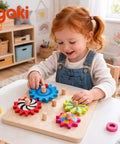 Child playing with Wooden Spinning Gears 8 Piece Montessori STEM Toy Set For 3 Year Olds Cause And Effect Building Set.