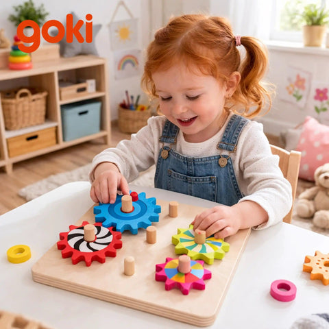 Child playing with Wooden Spinning Gears 8 Piece Montessori STEM Toy Set For 3 Year Olds Cause And Effect Building Set.