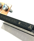Close-up of 125 Amp Multi Block Fuselink 7 Circuit Main Fuse With Screw, featuring connection terminals and amp ratings.