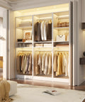 Freestanding Closet System With Adjustable Hanging Rods And Super Sturdy Steel Frame Built For No Sweat Setup And Roomy Multi Purpose Wardrobe Shoe Storage Tower in a bright room.