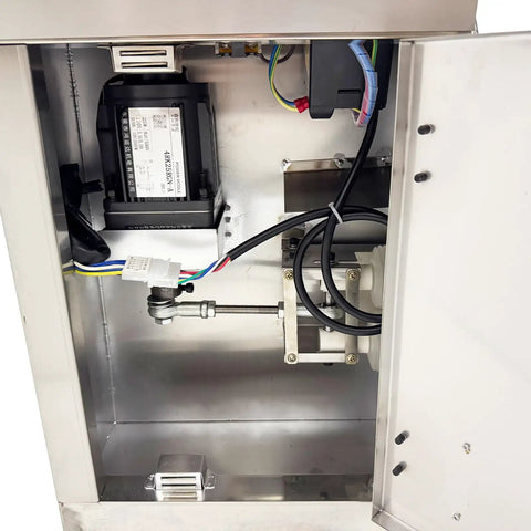 Inside view of Hardcore 110 Volt Oil Water Separator with motor and fluid pipes for CNC machining centers and coolant recycling.