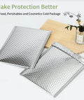 8X11 Thermal Bubble Mailers Pack Of 10 For Cold Shipping Insulated Foil Mailing Envelopes Waterproof Bubble Mailers For Food And Perishables Cosmetics Keeps Your Stuff Cold And Secure displayed with flowers.