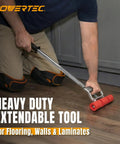 Man using Extendable Floor And Wall Roller With 17 To 27 Inch Adjustable Handle And 7.5 Inch Wide Roller Head on floor