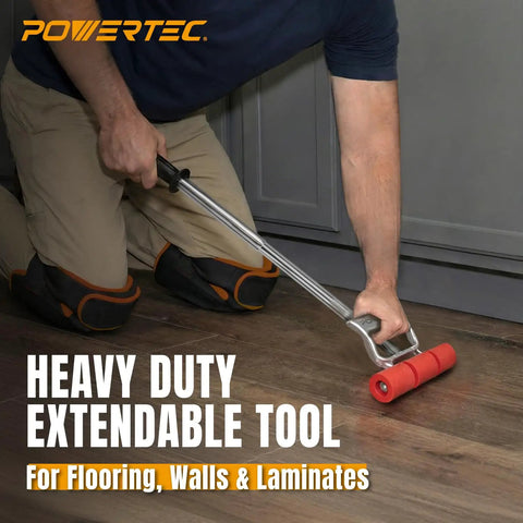 Man using Extendable Floor And Wall Roller With 17 To 27 Inch Adjustable Handle And 7.5 Inch Wide Roller Head on floor