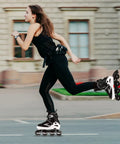 Woman skating outdoors in Adjustable Inline Skates For Teens And Adults With Light Up Wheels No Batteries Needed Easy Grow Fit.
