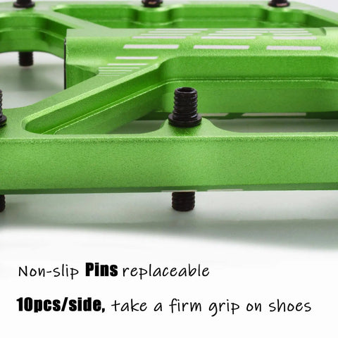 Close-up of green Grippy BMX MTB Pedals Fit 9 By 16 Inch Crank Lightweight Aluminum with non-slip pins and CNC machined platform.