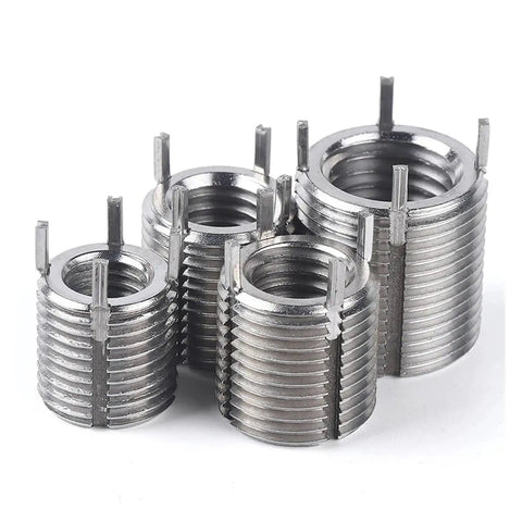 Heavy Duty Self Tapping Stainless Steel Thread Repair Inserts Thin Nuts M12 To M16 Size arranged in various sizes for car auto repair.