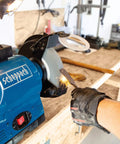 Heavy Duty Double Bench Grinder Boasts A Rock Solid 550 Watt Induction Motor For Noise Free Grindin Work With Adjustable Spark Guard in action.