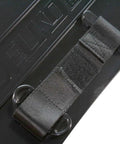 Close-up of Zunder Drywall Banjo Taping Tool With Belt Holster Hands Free Carry Option, showing durable black strap attachment.